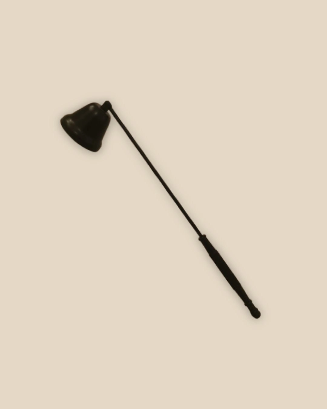 Black candle snuffer.